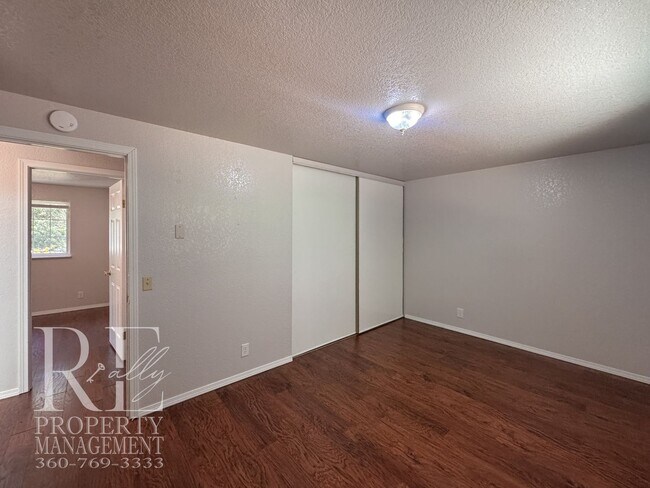 Building Photo - Freshly Painted East Bremerton Home with Expansive Decks & Flexible Living Space