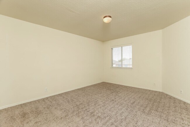 Building Photo - Spacious & Sun-Filled 4BR Retreat with Open-Concept Living and Versatile Dual Living Areas