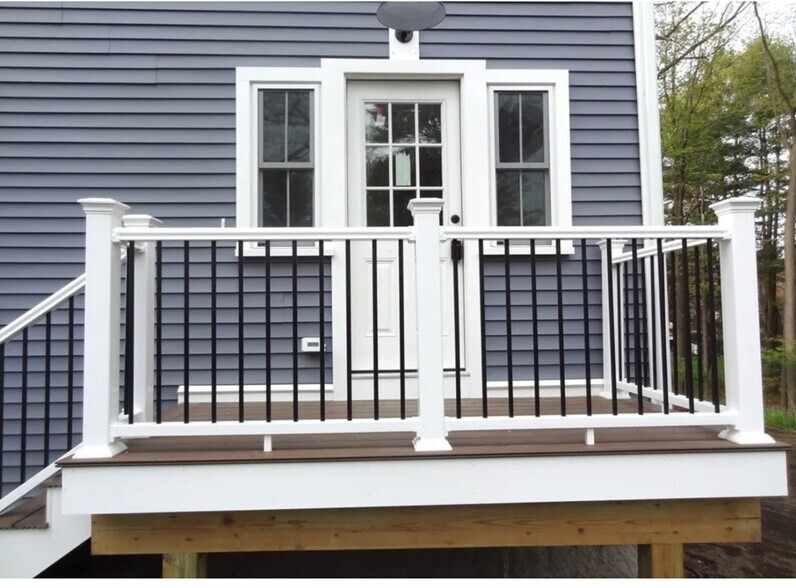 Designated front entrance with two parking spaces and nice yard for bbq-ing. - 81 Pleasant St