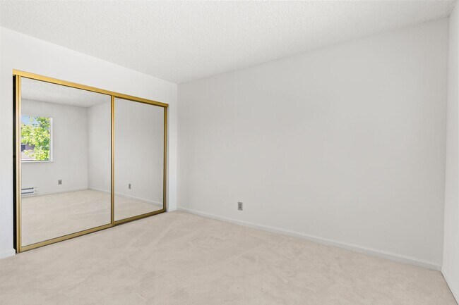 Building Photo - Modern 2-Bedroom Condo with Pool and Koi Pond Views
