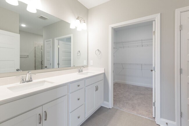 Building Photo - **BE THE LUCKY ONE TO LIVE IN THIS 2022-BUILT UPSCALE COTTAGE HOME IN THE PRESERVE AT BELLE POINTE**