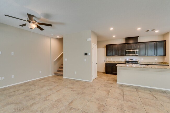 Building Photo - Spacious Townhouse with Loft & Rare 3-Car Garage!