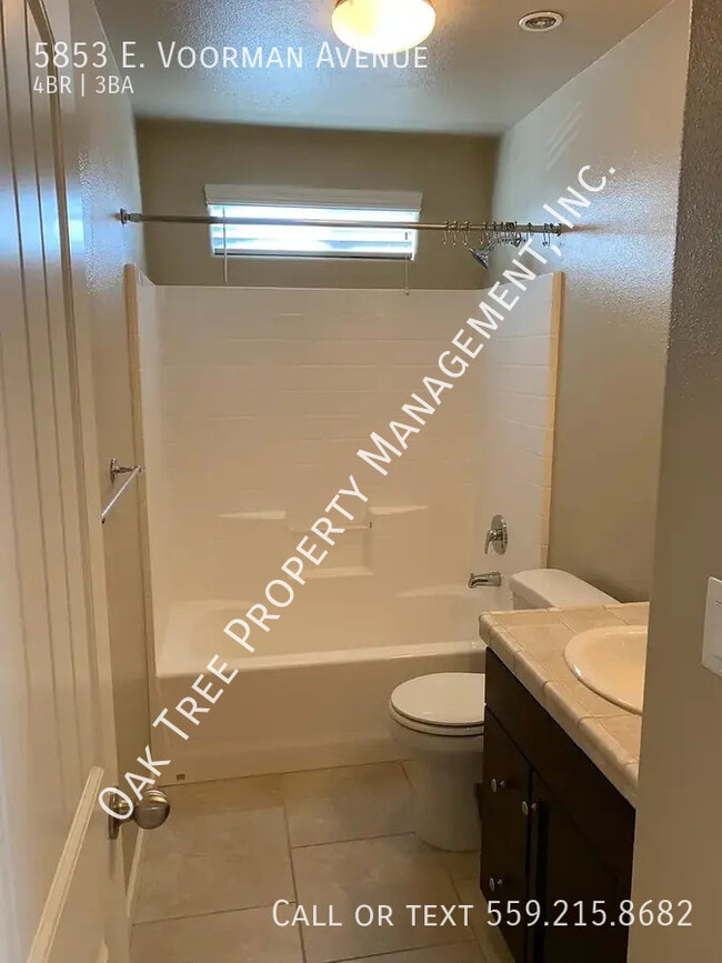 Building Photo - 5853 E Voorman Ave