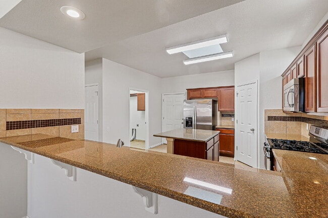 Building Photo - "Spacious 4-Bed Oasis with Granite Touches...