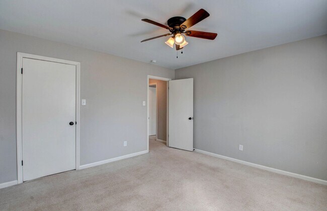 Building Photo - Welcome Home: Charming Brick Beauty with Covered Porch.