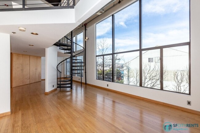Building Photo - Mission District: Top Floor Loft w/ Roof Deck, Parking & W/D in unit