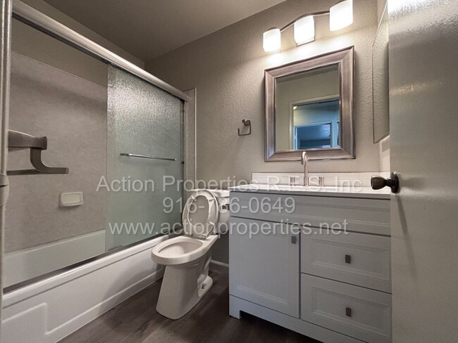 Building Photo - Updated 2 Bed, 2 Bath Duplex - 2 Car Garage - Two Large Patios - Close to Shopping, Restaurants, ...