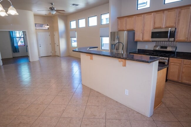 Building Photo - Gorgeous 3 Bedroom 2 Bathroom Home with Tile Throughout! Central A/C, 2 Car Garage!
