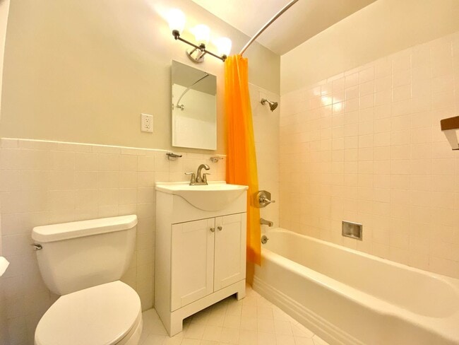Building Photo - REMODELED KITCHEN! Storage, Parking Available, On-Site Laundry!