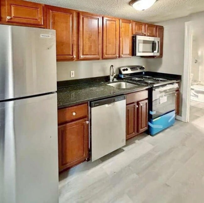 Building Photo - Prime location East Boston modern apartment on 1st floor next to T stop.