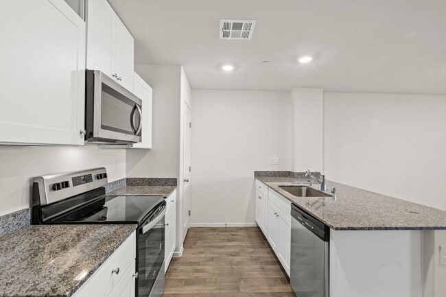 Building Photo - Contemporary 3 Bd Townhouse; Open Concept w/ Loft