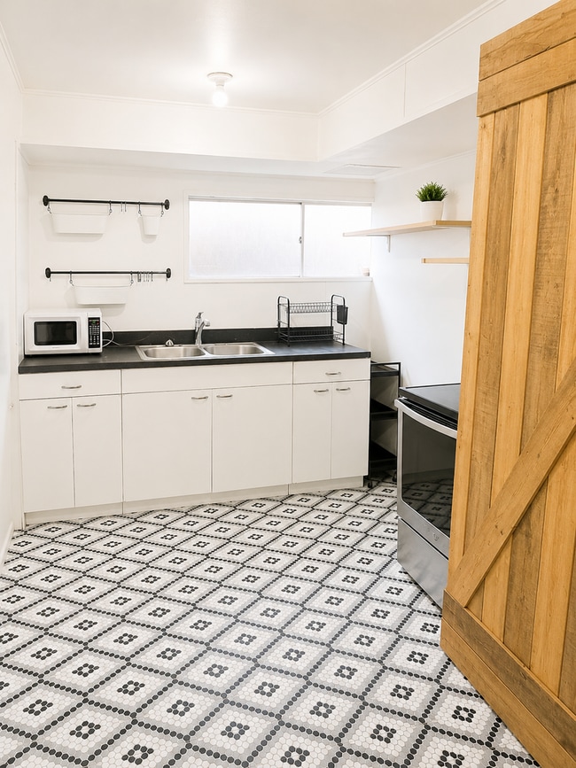 Building Photo - Large Basement Apartment For Rent