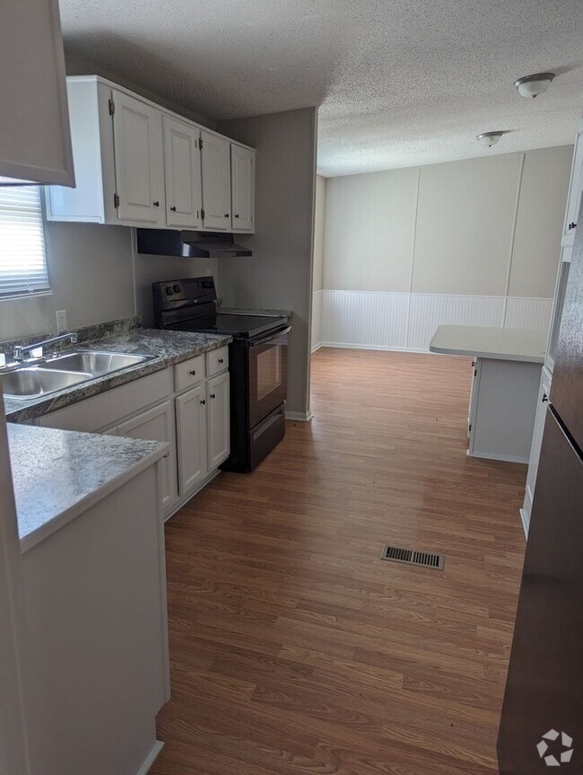 Building Photo - 4 BR, 2 BA 1,792 sq ft doublewide Trailer ...