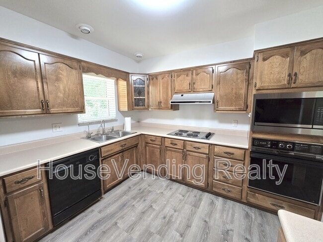 Building Photo - 11100 Hughlan Dr