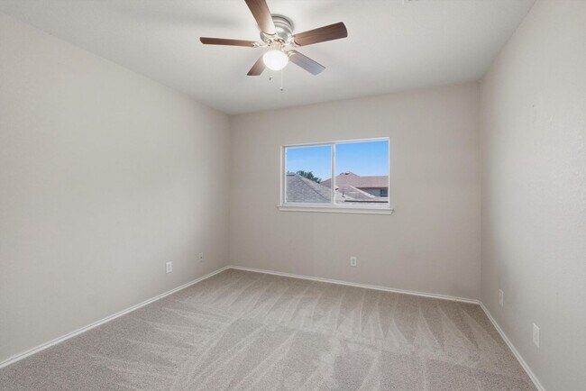 Building Photo - 4BR Home with Open Living Area & Included Appliances