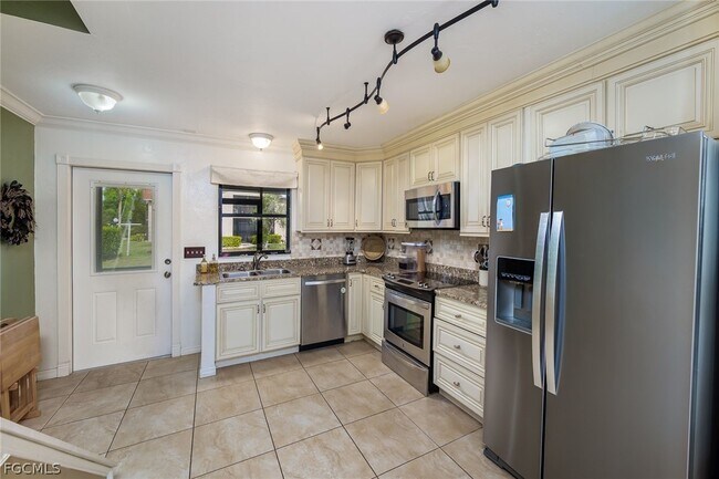 Building Photo - 9639 Eaton Gardens Ln