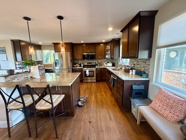 Building Photo - Sprawling 6 BR 4 BA Applewood Paradise - Live in Luxury with this Entertainer's Dream!
