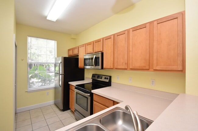 Building Photo - Bright and Airy Garland Townhome with Open Concept Living