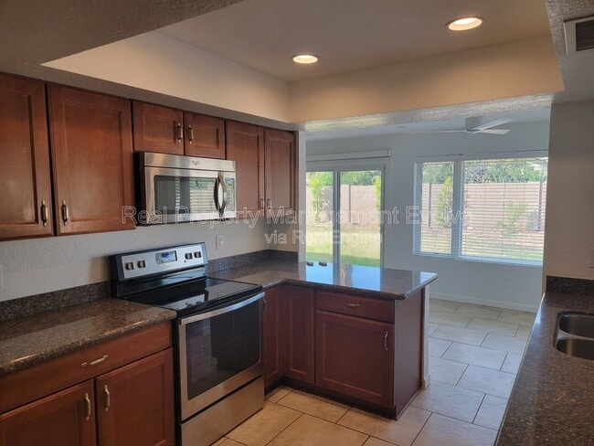 Building Photo - 4428 E Joan De Arc Ave