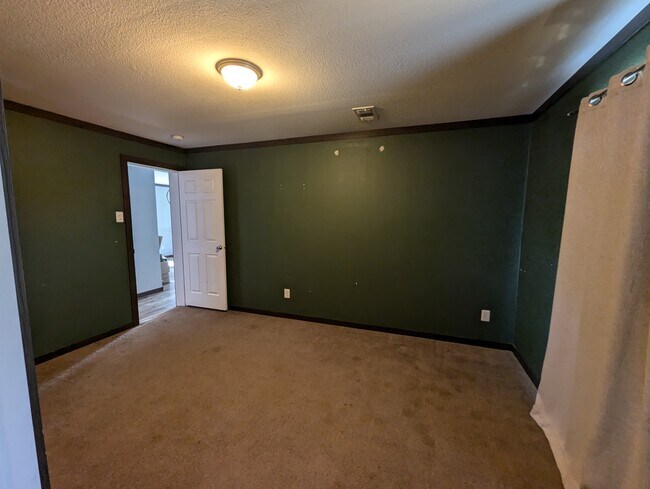 Room 3 looking at entry to room - 179 Davis Rd