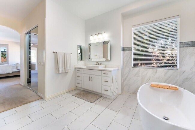 Building Photo - Furnished & Upgraded 1-Story Home on a Half-Acre with RV Parking in a Gated Community!