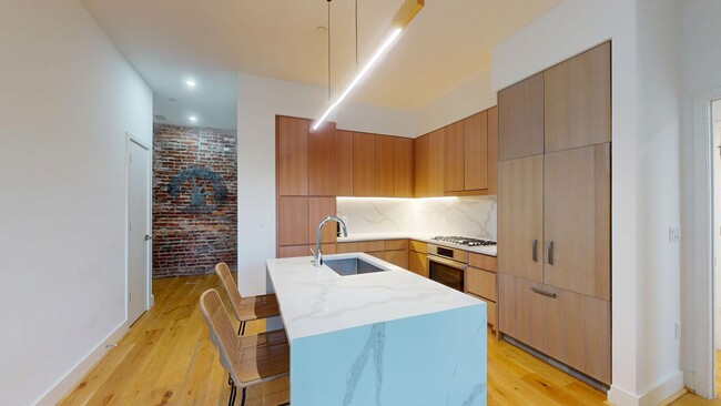 Building Photo - Stunning Fully Furnished Capitol Hill One Bedroom W/Parking Included!
