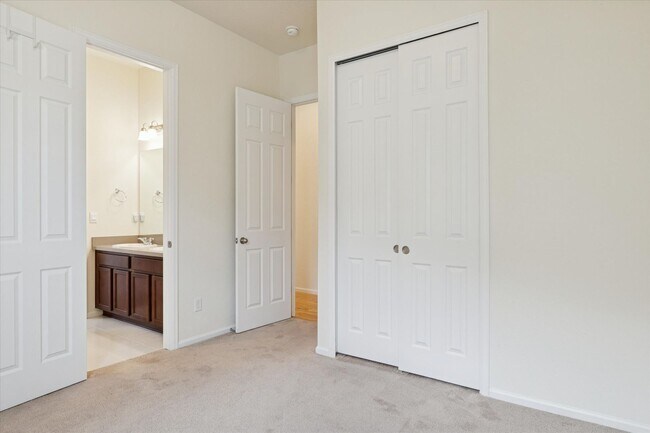 Building Photo - Modern 4-Bed Ranch in Erie with 13-Ft Ceilings, Solar Panels & EV Charger