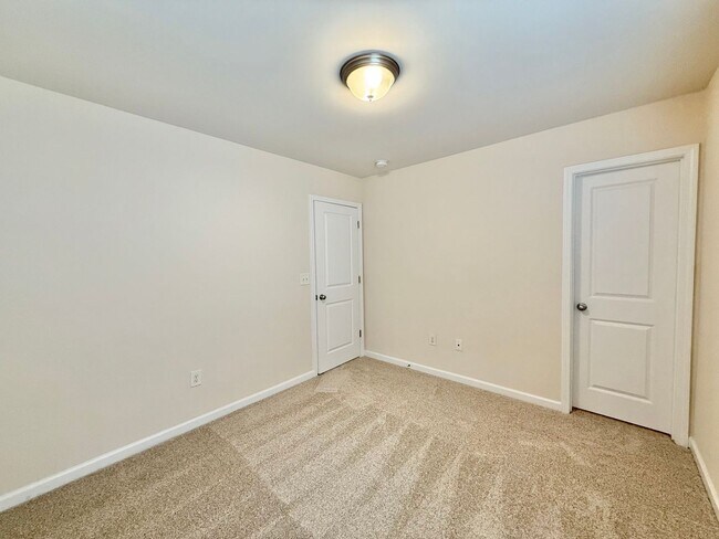 Building Photo - Spacious 4BD, 3BA Durham Home in a Prime Location Near Duke University, RTP, and RDU Airport