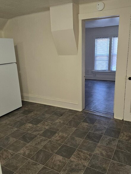 Kitchen looking into bedtoom/living room - 1335 N Church St