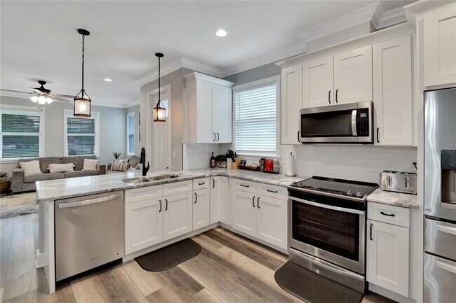 Building Photo - 3002 E 38th Ave