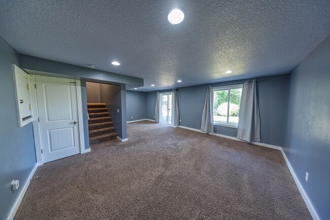 Building Photo - 4 Bedroom house in Hazel Dell - AC, large ...