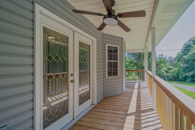 Building Photo - SHORT TERM - Spacious 3-Bedroom home with Wrap-Around Porch