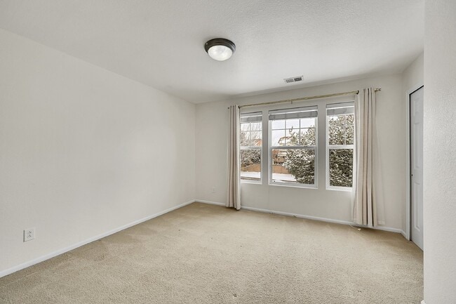 Building Photo - $1,795.95- 2-Bed 2.5 Bath Townhome in Colorado Springs with Fenced-in Yard and Laundry In Unit!