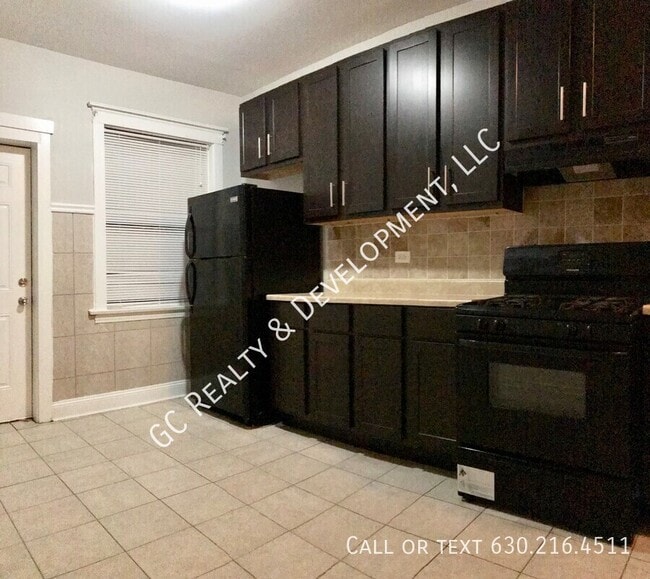 Building Photo - 1515 E 67th Pl