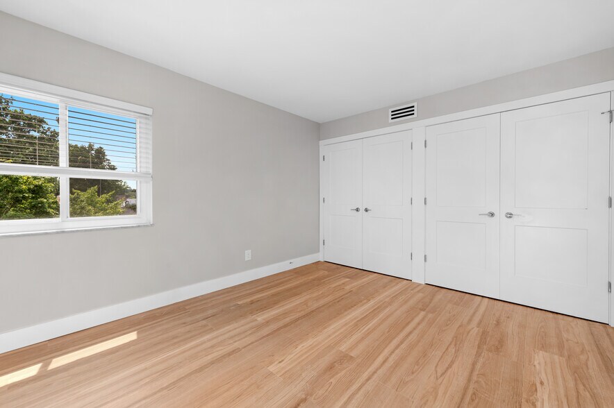 Bedroom Closet with Built In Cabinets - 20333 Detroit Rd