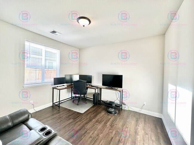 Building Photo - Welcome to your dream home, where modern elegance meets unparalleled convenience!