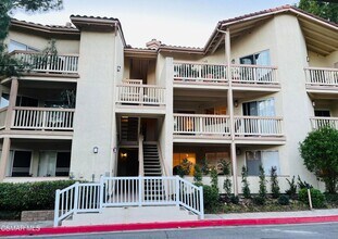 Building Photo - Welcome to this beautifully situated first-floor end unit