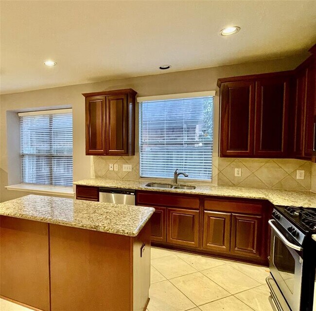 Building Photo - 5527 Custard Apple Trail