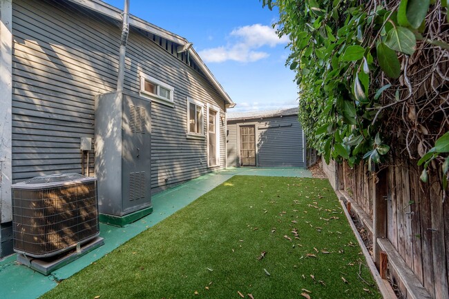 Building Photo - Stylish 2-Bedroom Retreat with Private Yar...