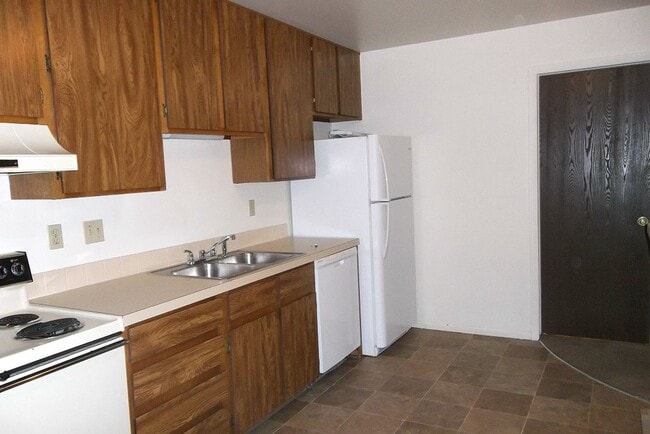 Building Photo - Prime Riverside Condo Steps from Edora Park & Trails