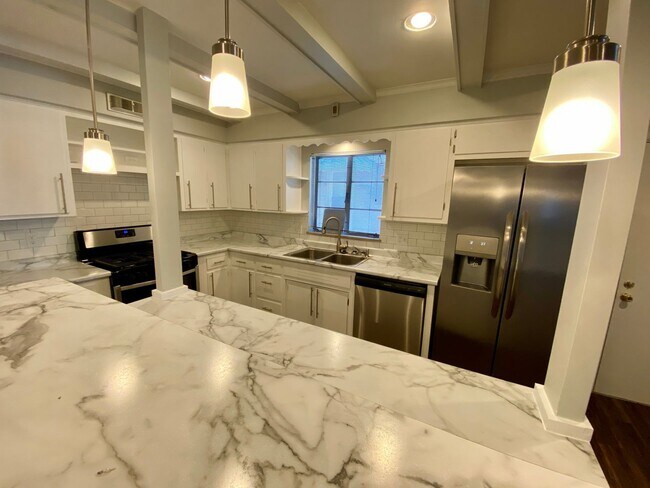 Building Photo - Remodeled Westgate Home with Attached Prof...