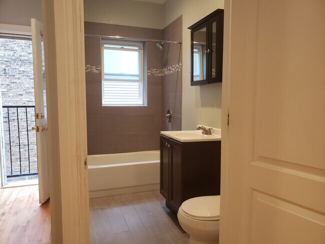 Building Photo - 4551 N Christiana Ave