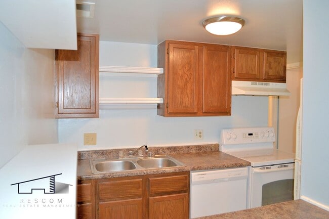 Building Photo - Lower-Level Roy 2 Bedroom, 1 Bathroom Condo Available!