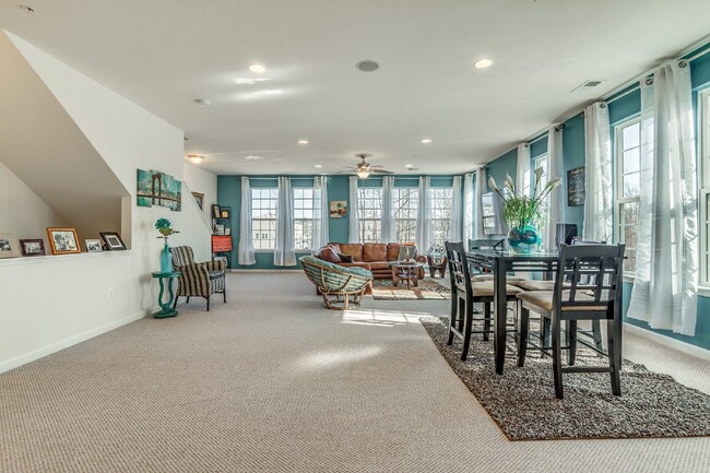 Building Photo - 3-bedroom, 2.5-bathroom condo with a great open-concept main level.