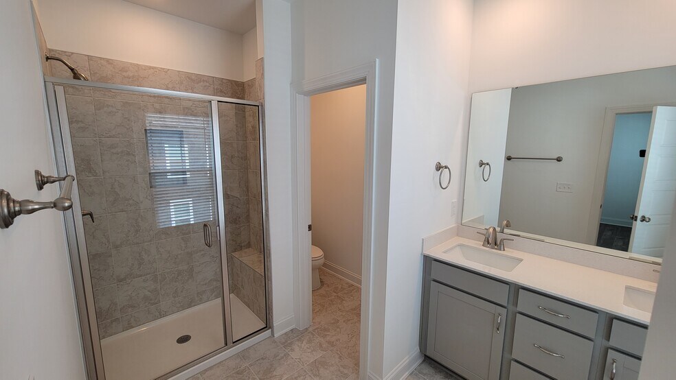Owner's Bath - Tile shower- large shower, private toilet - 506 Village Branch Ln