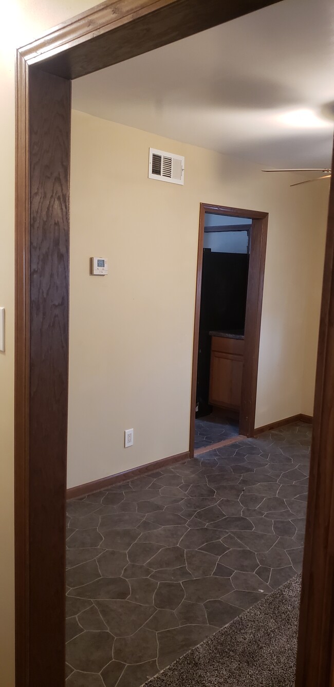 Dining area leading to kitchen - 449 S Leonine Rd