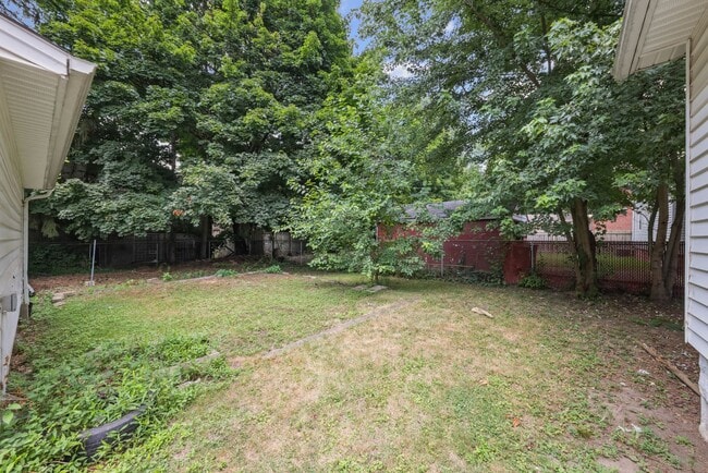 Building Photo - Bright living ? cozy dining flow for everyday comfort and easy entertaining.