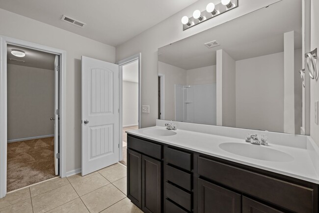Building Photo - Spacious 5 Bedroom Home with 2-Car Garage,...