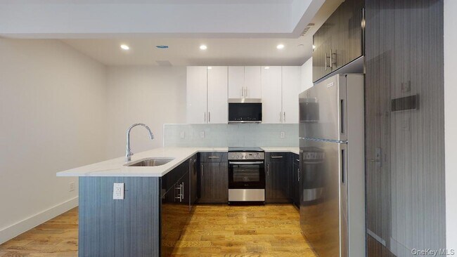 Building Photo - 138-28 Queens Blvd