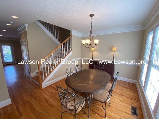 Building Photo - Colonial Green Row Home with Two Car Garage